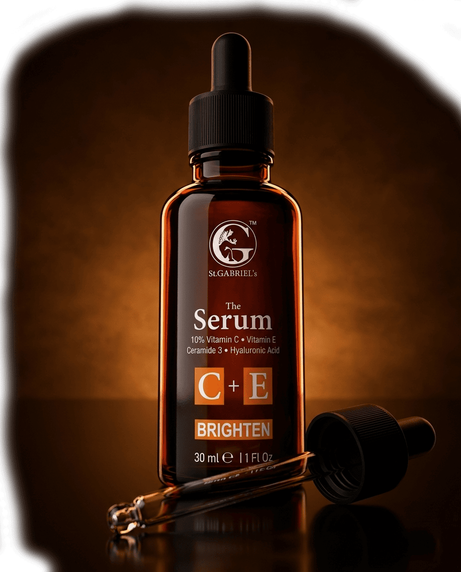 The Serum C+E amber glass dropper bottle by St.GABRIEL's, dramatic low-angle editorial shot